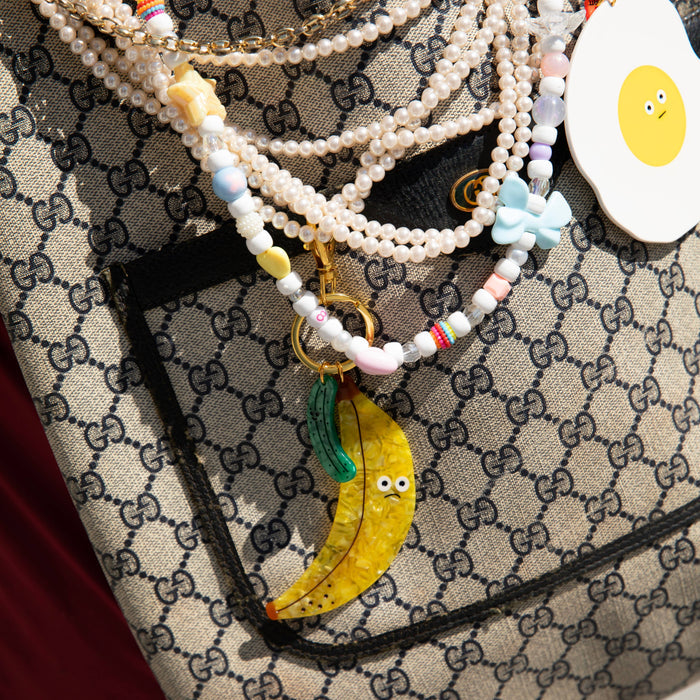 Carolyn Suzuki Charm - Pickle N Banana