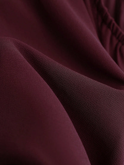 Franclia Casual Women's Red Violet Spaghetti Strap Cami Top With Flared Hem Knot Detail And Plain Fabric Regular Length