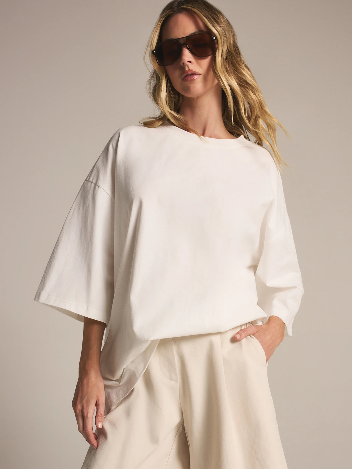 KSTM Oversized Drop Shoulder T-Shirt With Wide Sleeves And Round Neck For Effortless Casual Style