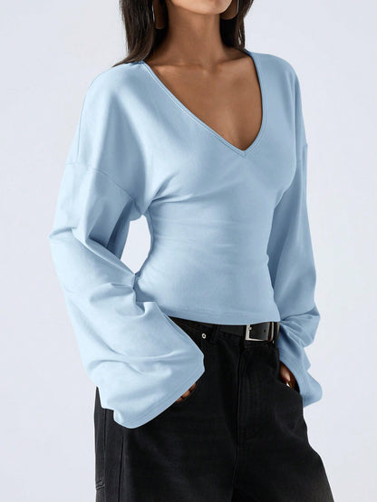 LYSMO 2026 Women's Minimalist Bell-Sleeve Shirt,Solid Color Deep V-Neck Elegant Top For Commuting,Christmas,New Year,Baby Blue,Autumn,Casual,Brunch Stylish